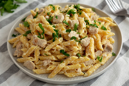 Homemade One-Pot Chicken Alfredo Pasta with Parsley., a Photo by LiudmylaChuhunova
