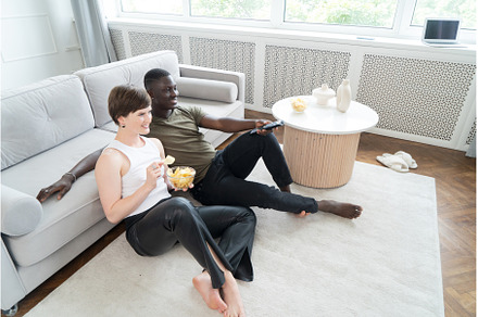 Young man watching TV, a Person Photo by Neirfy