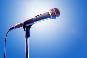 Mic on microphone stand with lights featuring mic, performance, and event, an Arts & Entertainment Photo by Davizro's Market