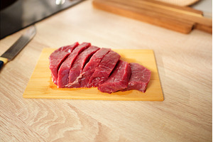 Freshly sliced raw beef laid on a, a Food & Drink Photo by darksoul72