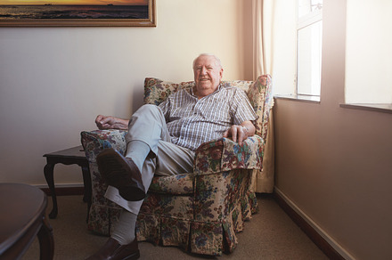 Relaxed elderly man sitting, a Person Photo by Jacob Lund