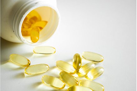 Open bottle with omega-3 capsules, a Health & Medical Photo by volodymyrshtun13795