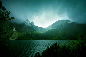 Fog and dark clouds in mountains.