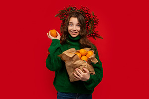 Young girl in green sweater, a Holiday Photo by Elena Vagengeim