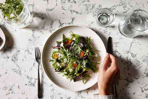 Salad on a marble table, a Photo by Beautiful things