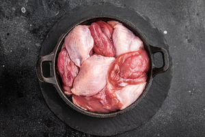 Raw quail breasts in a cast iron skillet with thyme and pink pep, a Food & Drink Photo by composter-box@mail.ru