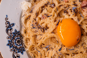 Cooking carbonara gourmet food parmesan egg yolk, a Food & Drink Photo by Photo Drive Studio