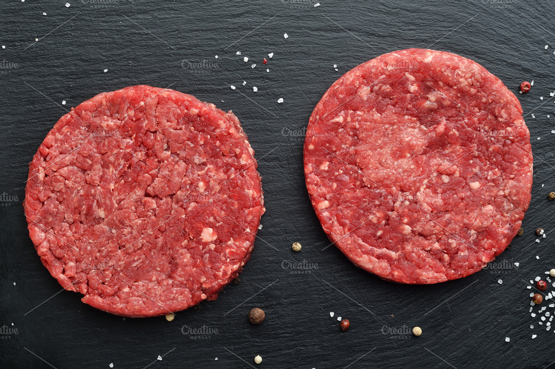 Fresh raw beef burger patties featuring beef, prime, and black angus, a Food & Drink Photo by Food Stock