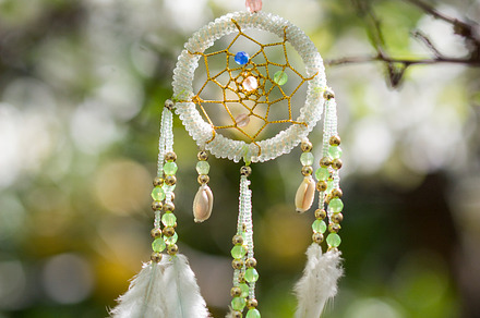 Mint dreamcatcher hanging on tree