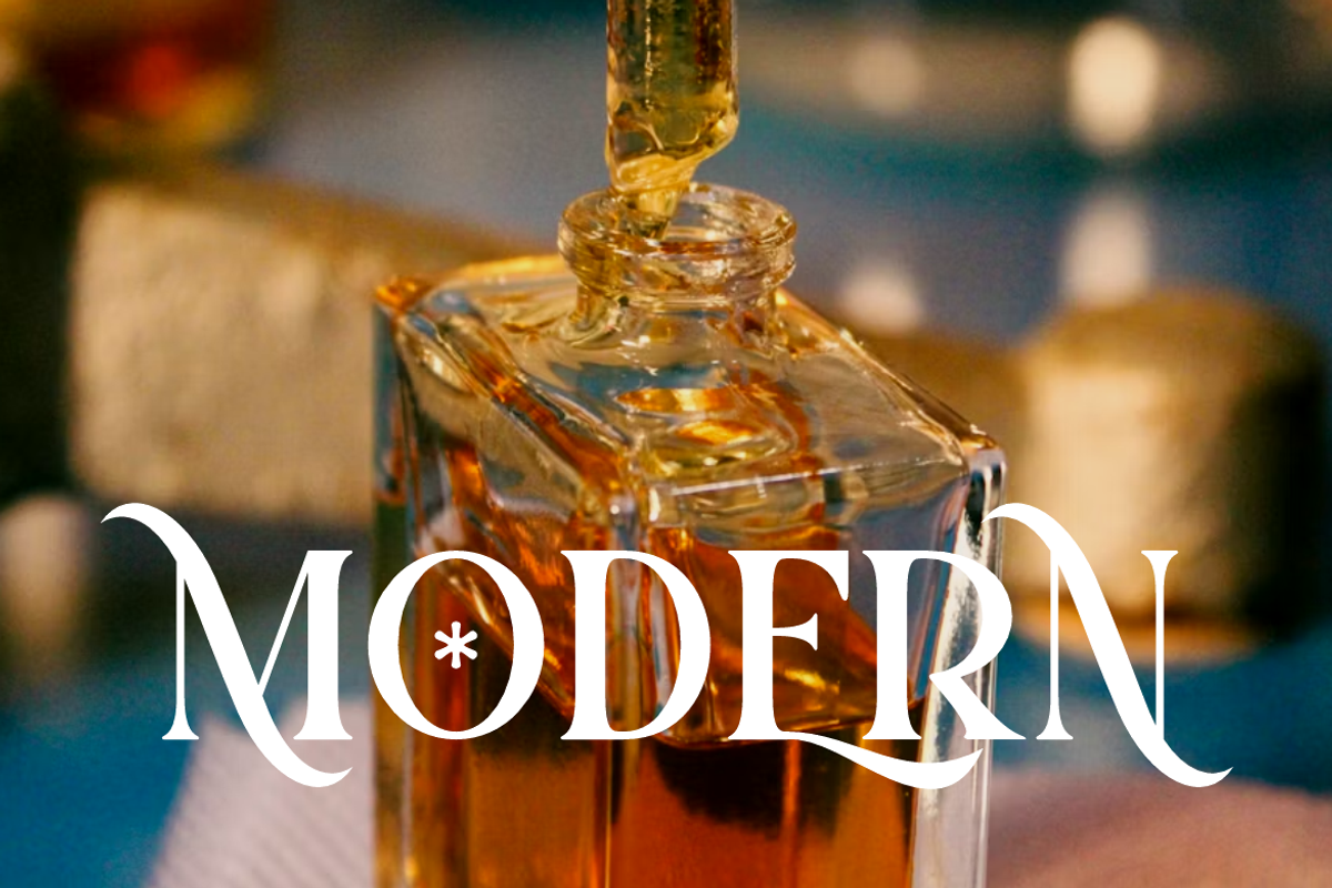 Luxoteg - Luxury Perfume Font, a Serif Font by QR Design Studio (Photo 4 of 15)