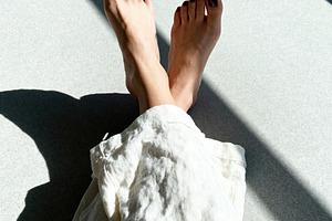 Minimalist Feet with Red Pedicure, a Beauty & Fashion Photo by Virgo Studio