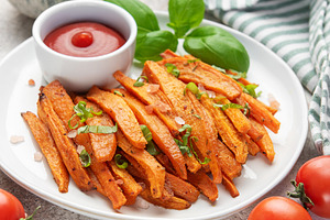 Sweet potato fries with ketchup dipping sauce for healthy snacki, a Food & Drink Photo by Olena Rudo