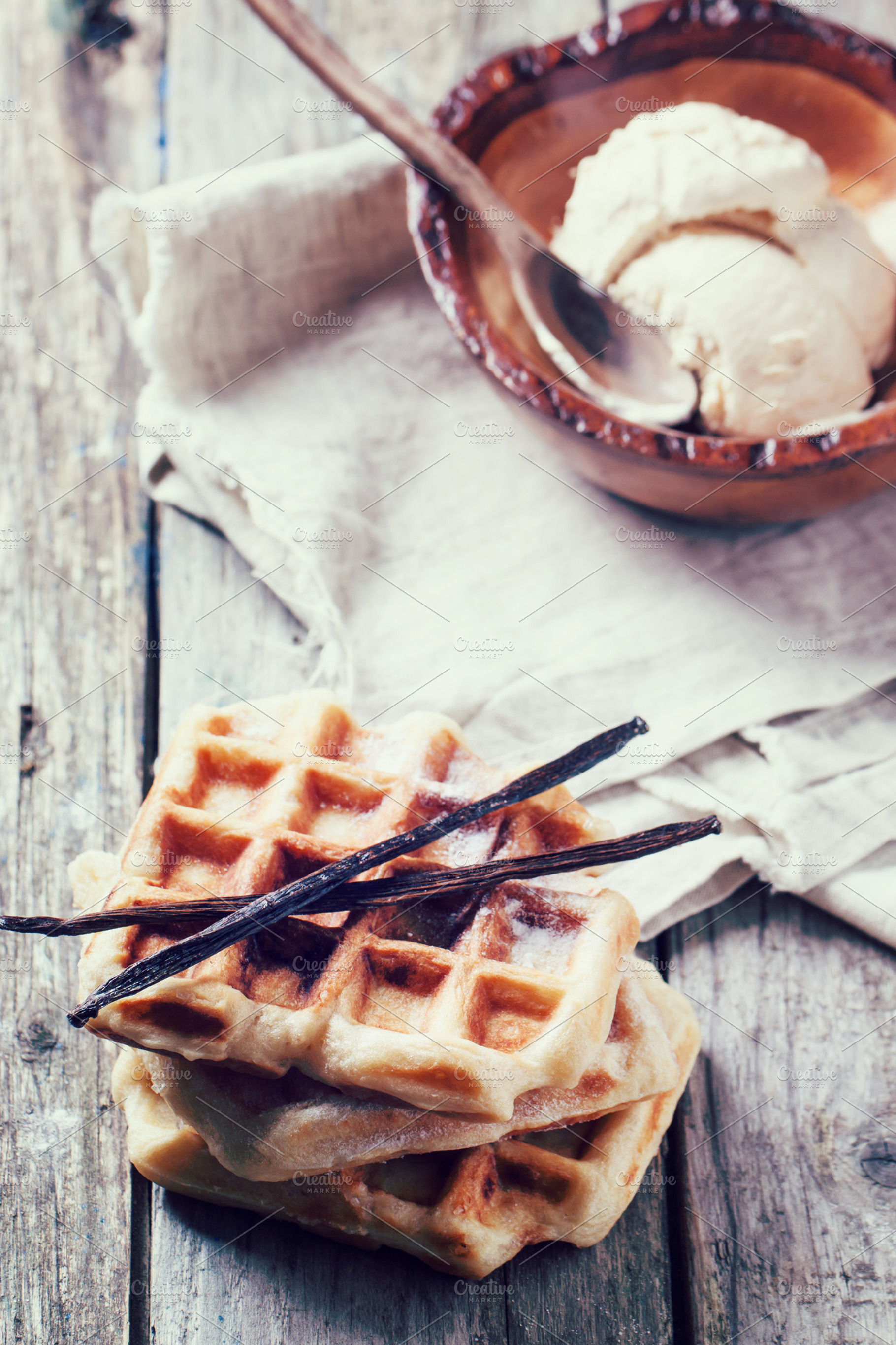 Waffles with vanilla and ice cream featuring waffles, waffle, and sweet