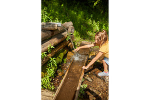 Child refreshing face at natural, a Nature Photo by IlliaBondarPhotography
