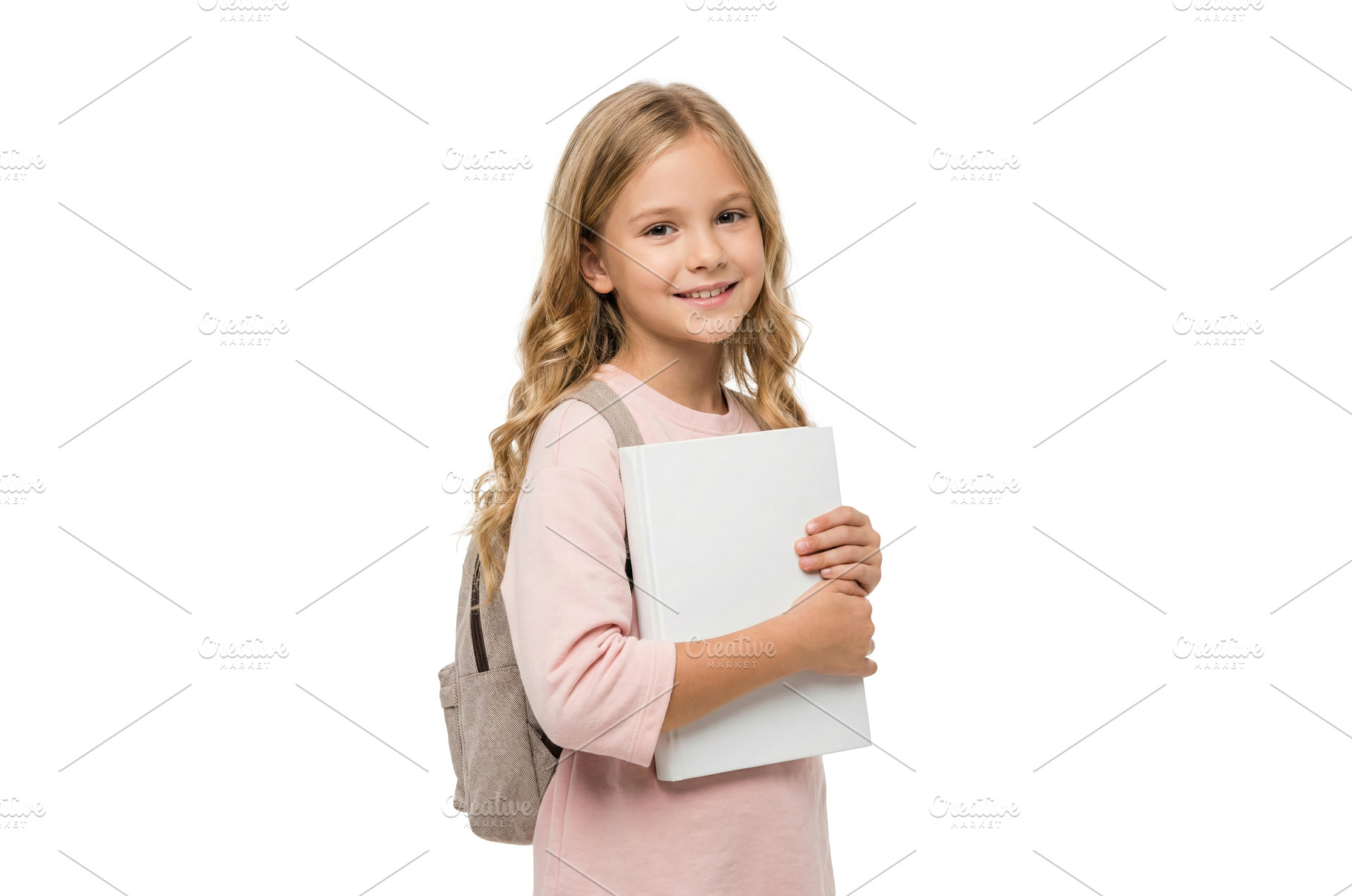 Smiling Girl With Book, a School & Education Photo by CREATIVEDEF