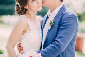 Groom kisses the Bride