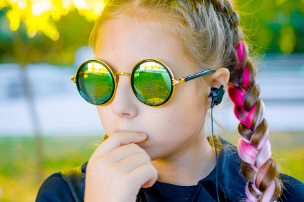 blonde girl wearing a sunglasses  with pink kanekalon in hair in, a Person Photo by vimart