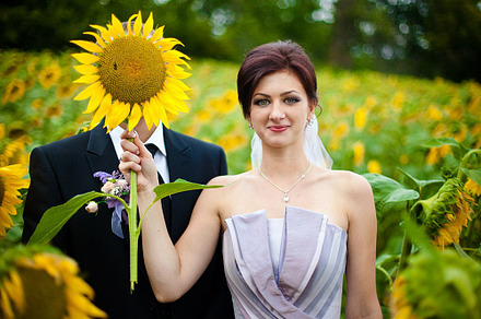 Pretty bride higes groom's face, a Person Photo by IvashStudio