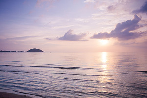 Tropical sunset on the beach stock photo containing abstract and background