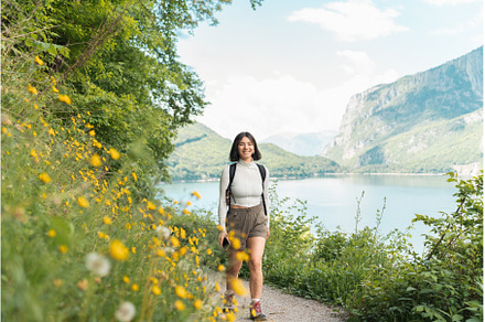 Glowing with joy, a woman strolls a