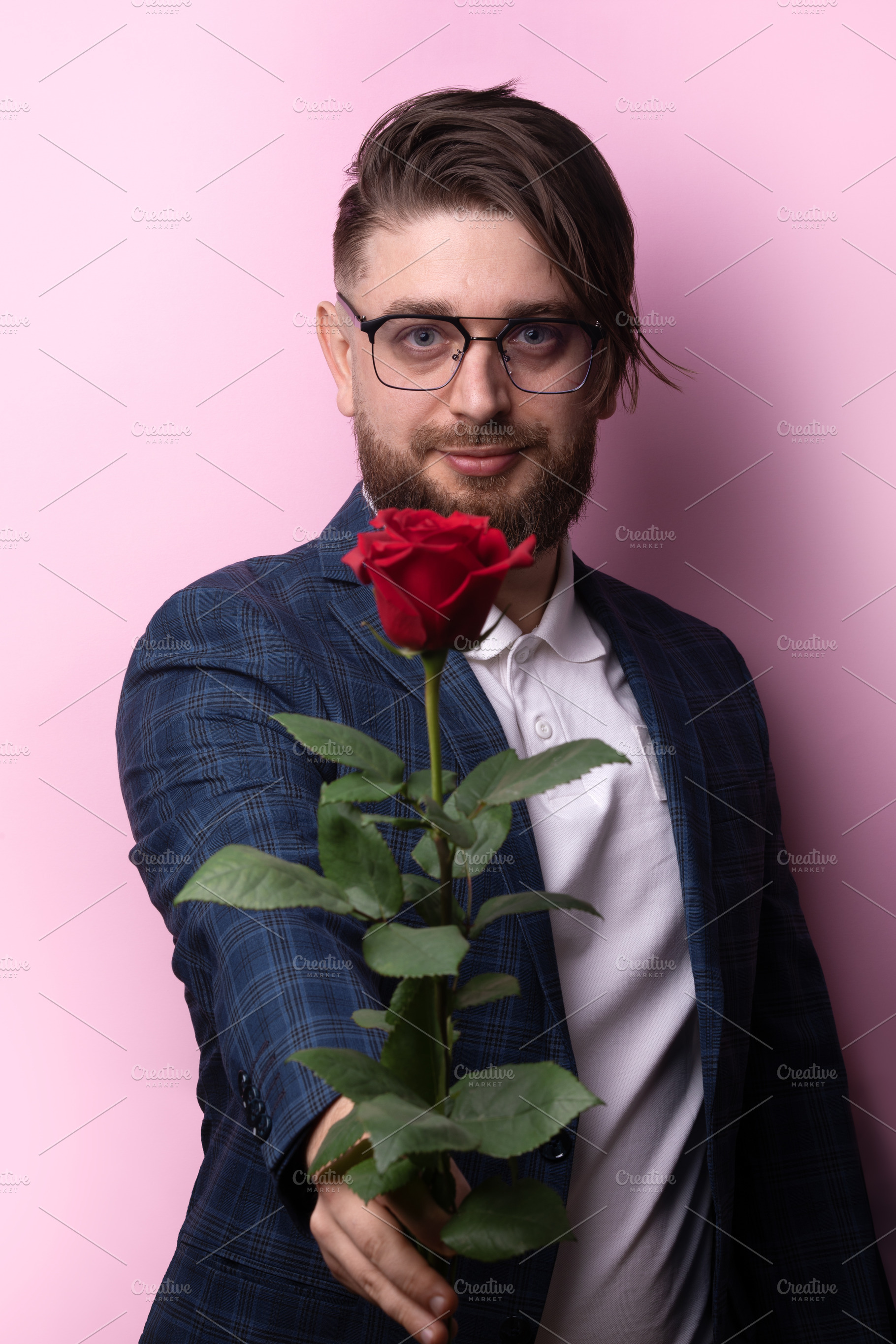 Man Offering Red Rose, a Person Photo by Ales Munt
