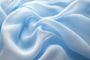 Soft, flowing light blue satin fabric draped elegantly, creating a serene and c, a Background Photo by ImageMir