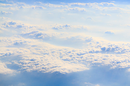 Blue sky and fluffy white clouds stock photo containing blue sky and white