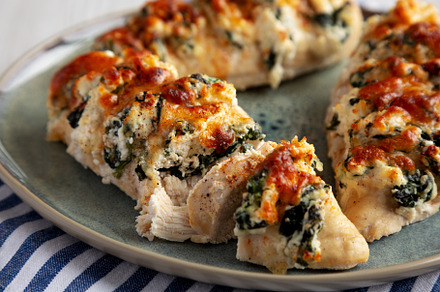 Homemade Hasselback Chicken on a Plate, side view. Close-up., a Food & Drink Photo by LiudmylaChuhunova