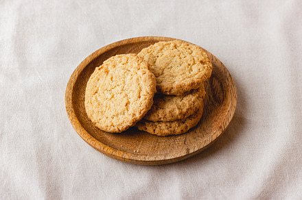 Oatmeal cookies on a wooden plate