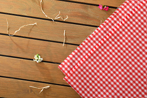 Red Gingham Picnic Cloth on Wooden Table, a Holiday Photo by Davizro's Market