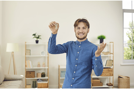 Happy male homeowner boasting of, a Person Photo by StudioRomantic