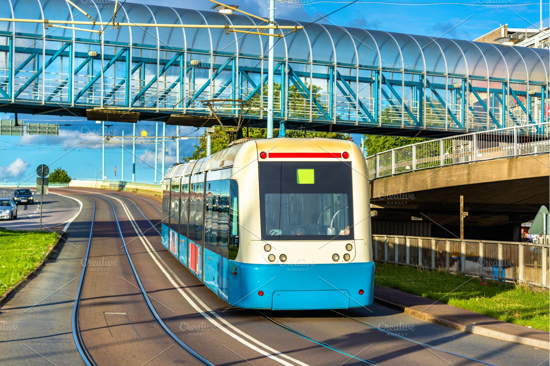 Tram on a street of gothenburg sweden featuring tram, goteborg, and sweden, a Transportation Photo by Leonid Andronov