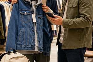 Men shopping for fall fashion jacket, a Photo by Dvoevnore photos