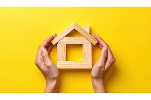 Hands framing a wooden house, an Architecture Photo by Igor Tichonow