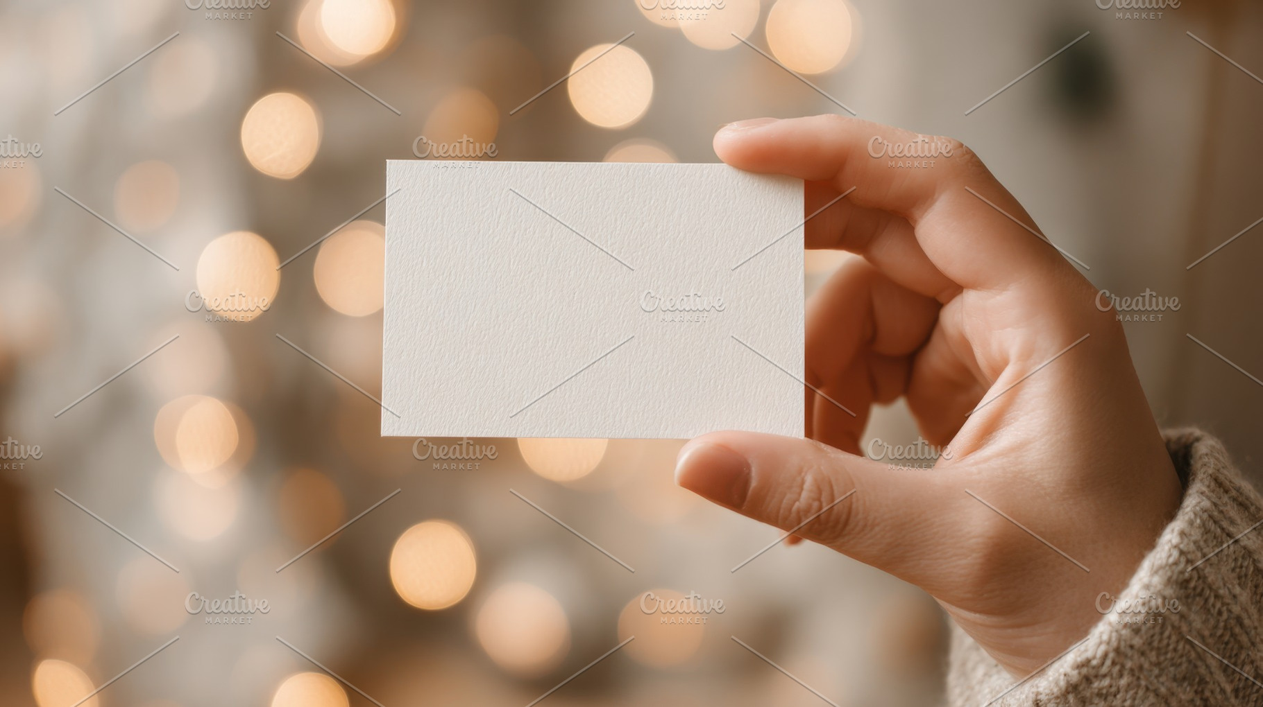 Holding a blank card in hand, a Photo by Beautiful things