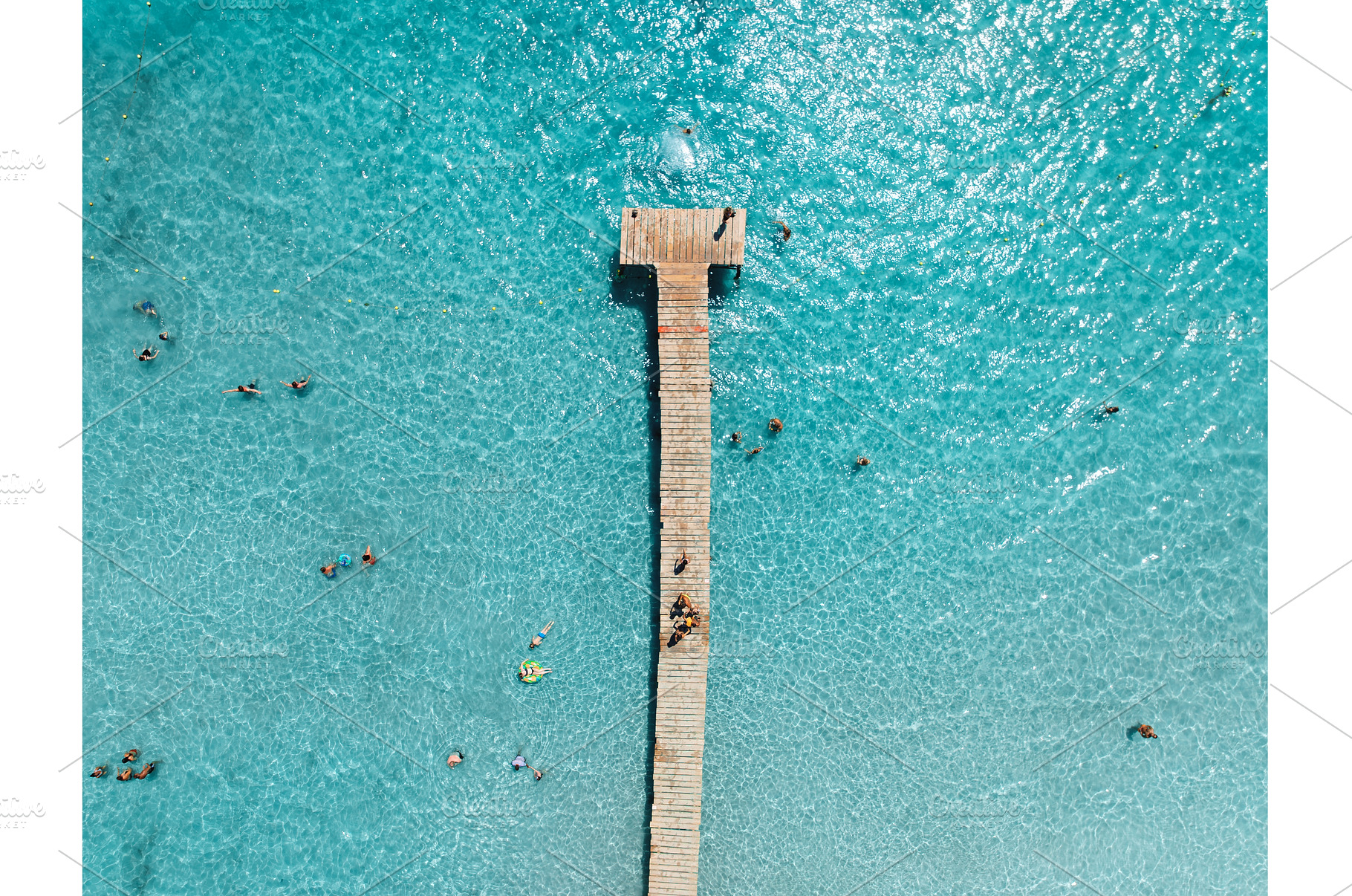 Aerial View of pier and swimming, a Nature Photo by den-belitsky
