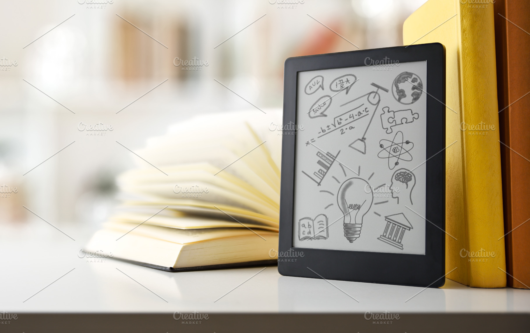 Digital tablet with drawings of school subjects on study desk, a School & Education Photo by Davizro's Market