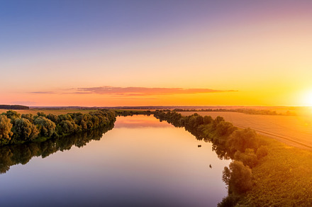 Sunset on the river at summer., a Nature Photo by Eugene_Photo