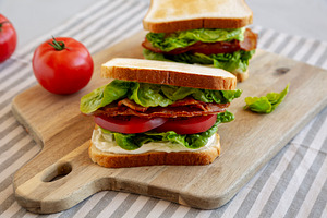 Homemade BLT (Bacon Lettuce Tomato) Sandwich with Mayo, side vie