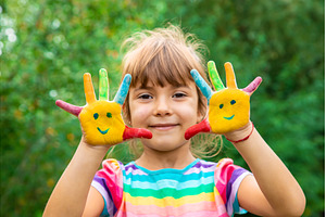 Children's hands with smile paints, an Arts & Entertainment Photo by yanadjana