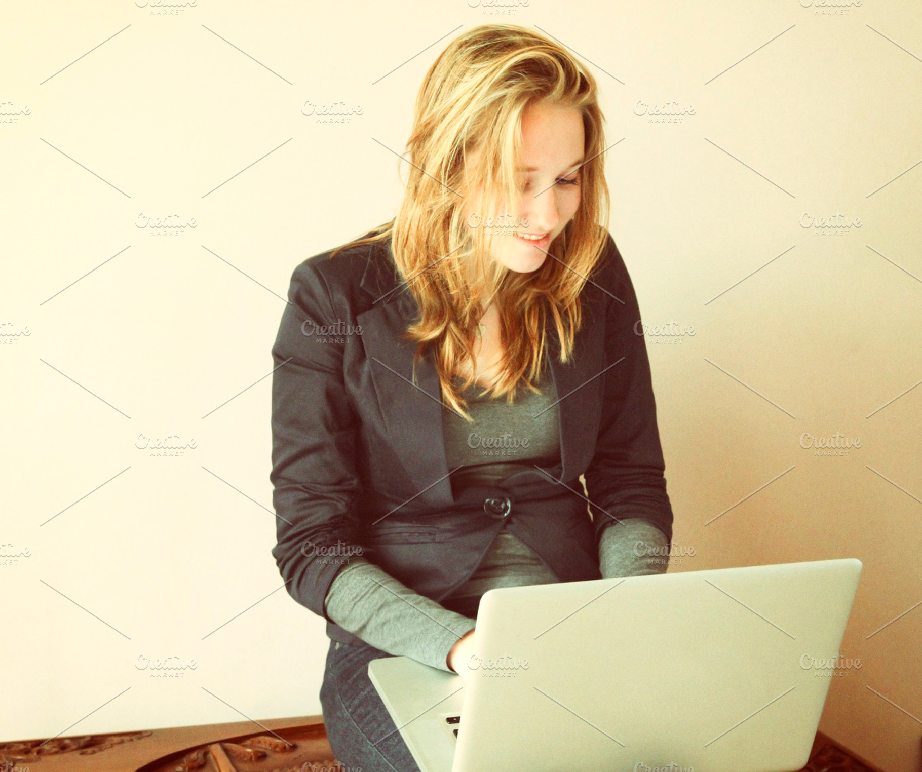 Pretty Girl Working On A Laptop Containing Apps Application And Popular