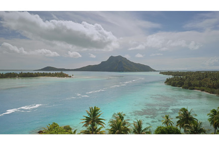 Turquoise lagoon separating lush, a Nature Photo by Goinyk
