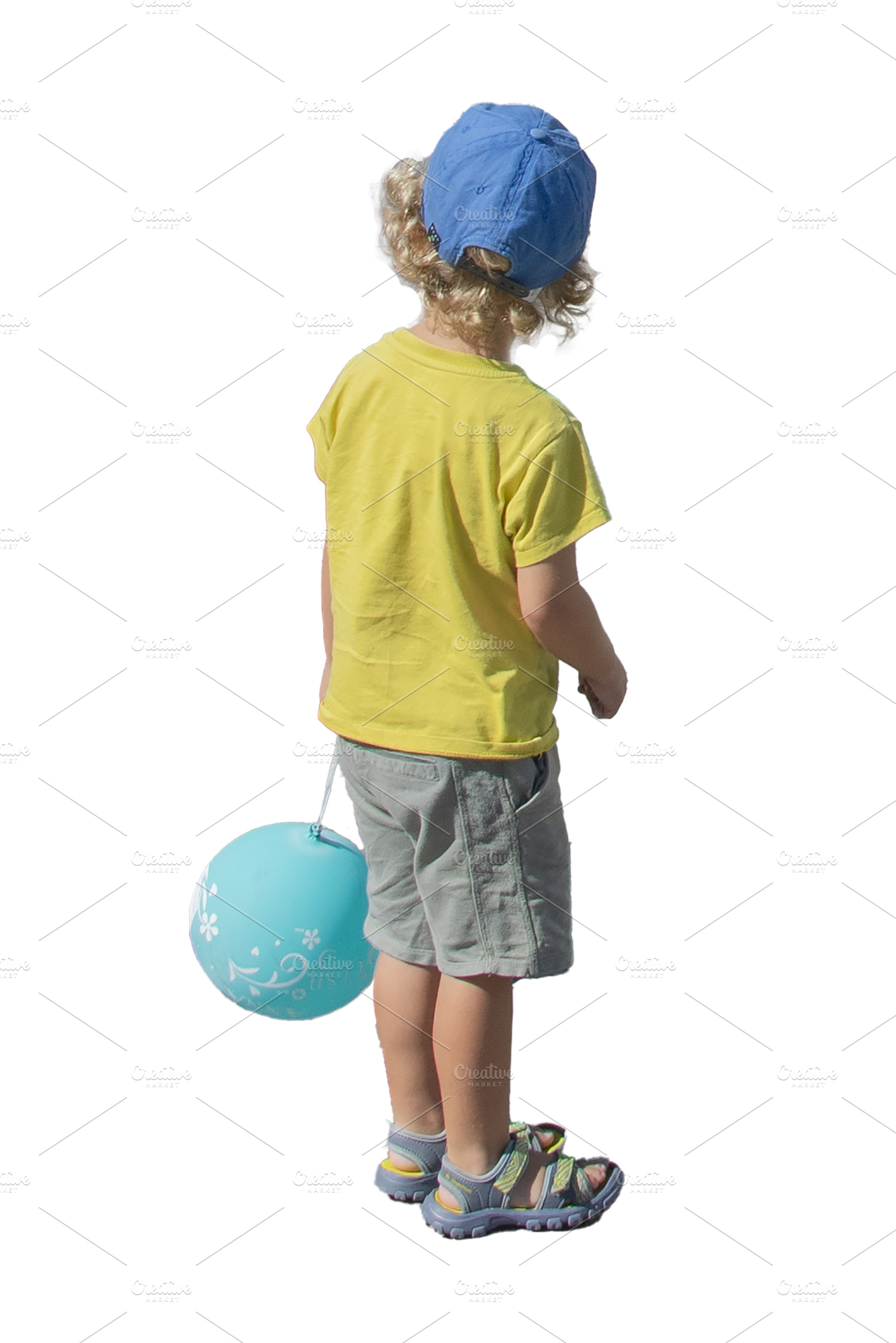 kid standing while holding a glove in one hand, a Person Photo by DanFLCreativo