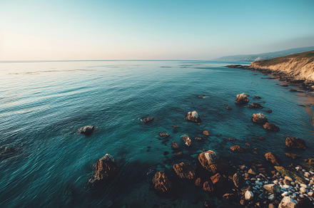 A serene coastal landscape showcases, a Photo by Tanuart