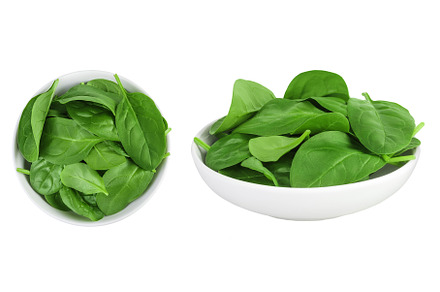 Baby spinach leaves in ceramic bowl