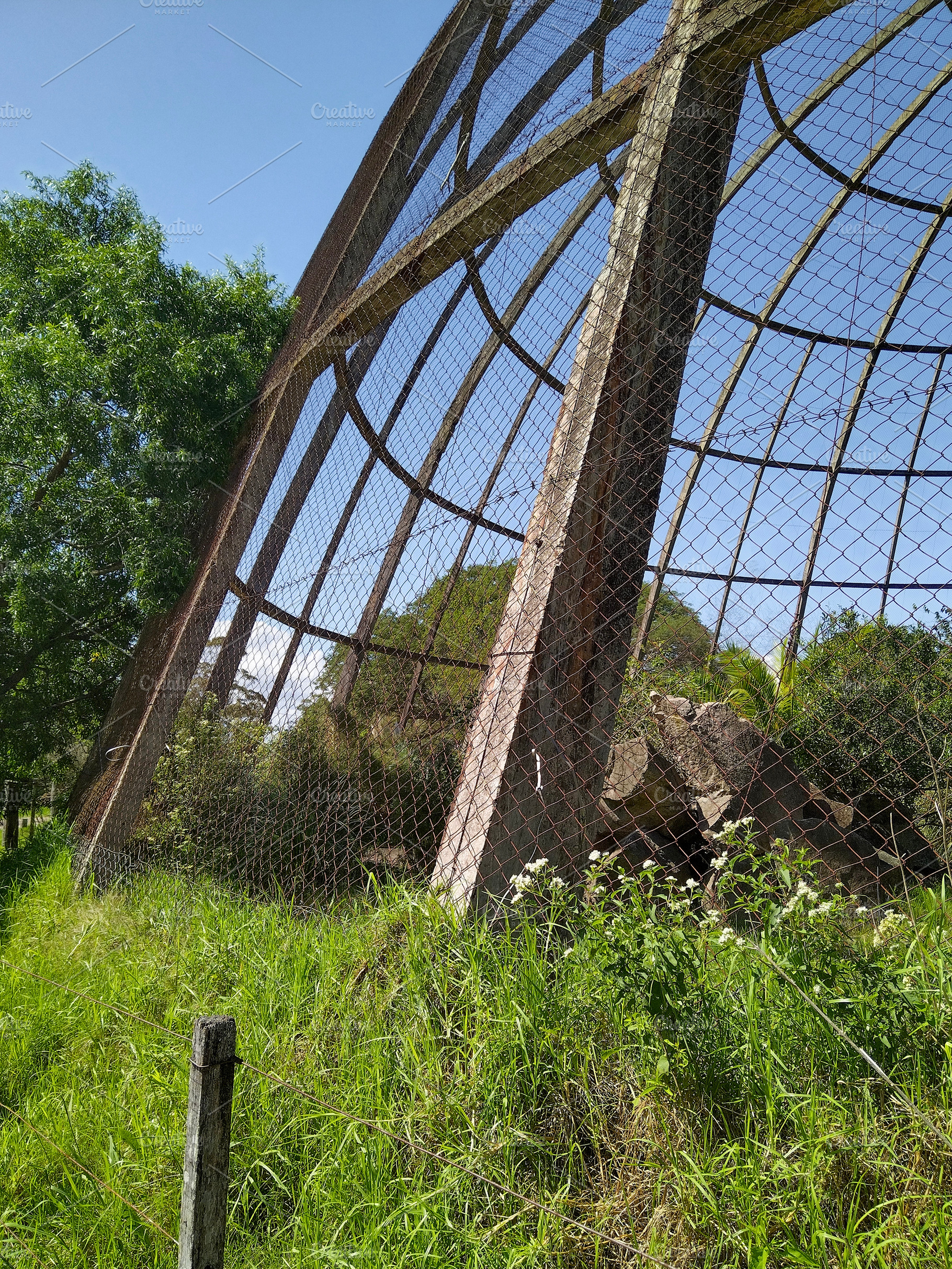 Empty metal dome in natural landscape, an Architecture Photo by DanFLCreativo