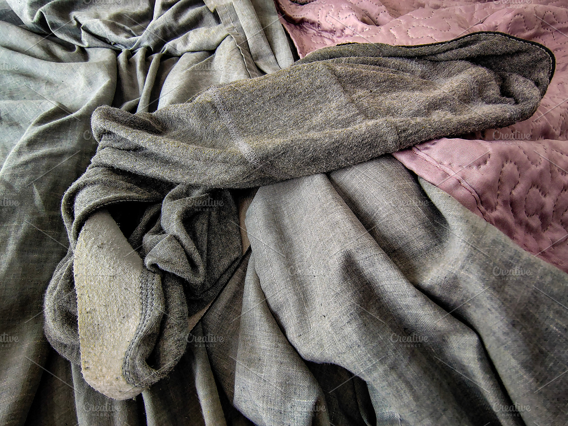 Gray boxer shorts camouflaged by sheets of the same color on the, a Beauty & Fashion Photo by DanFLCreativo