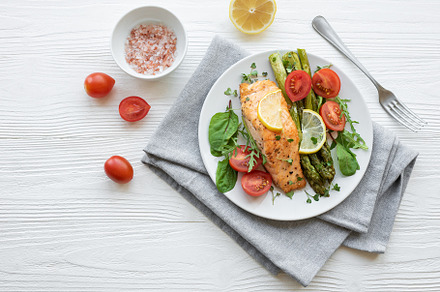Baked Delicious salmon, green asparagus on  plate, a Food & Drink Photo by Olena Rudo