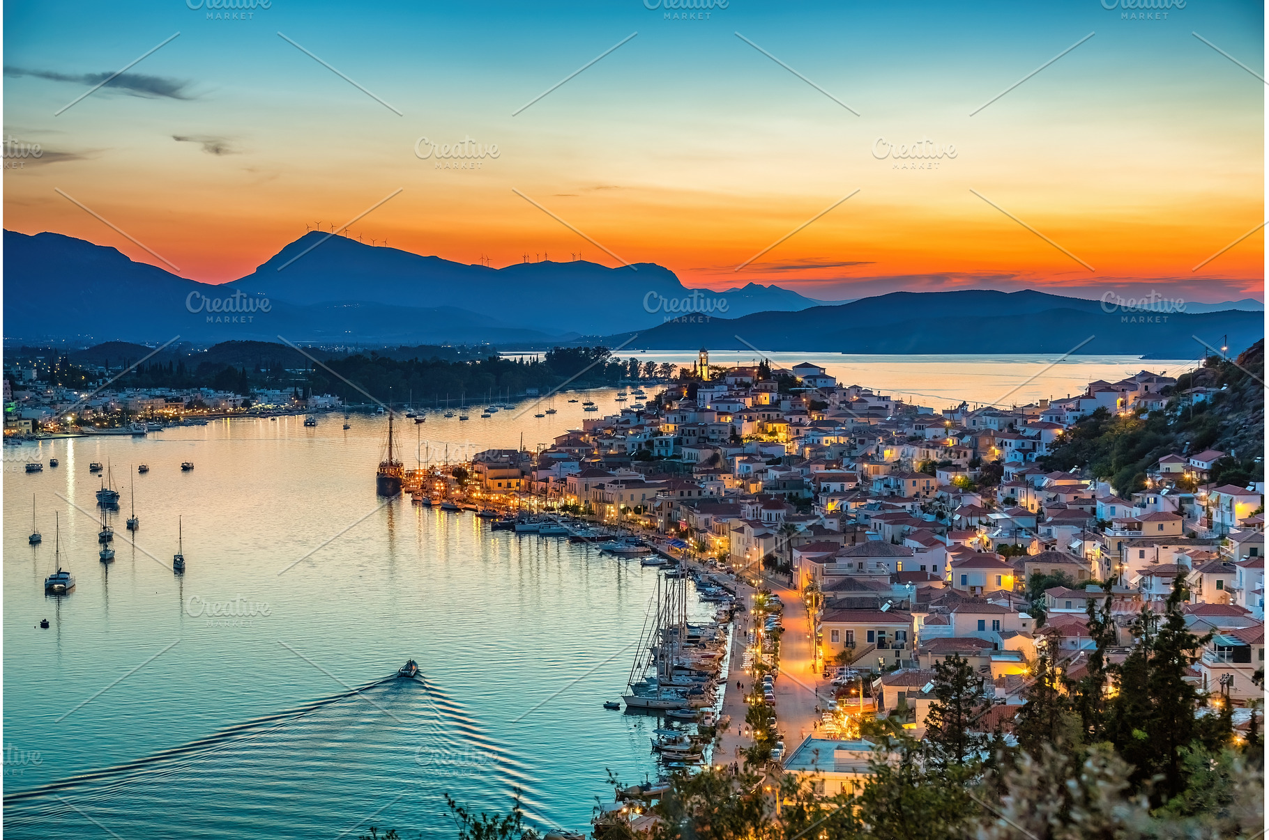 Panoramic view of Poros at sunset, an Architecture Photo by sborisov