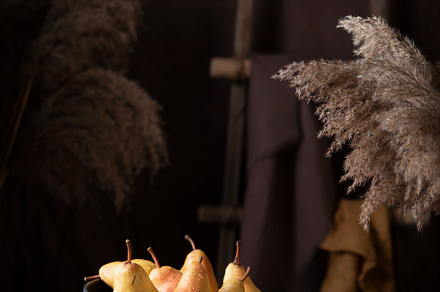 Sweet pears in rustic style on the dark background, a Food & Drink Photo by oxana.denezhkina